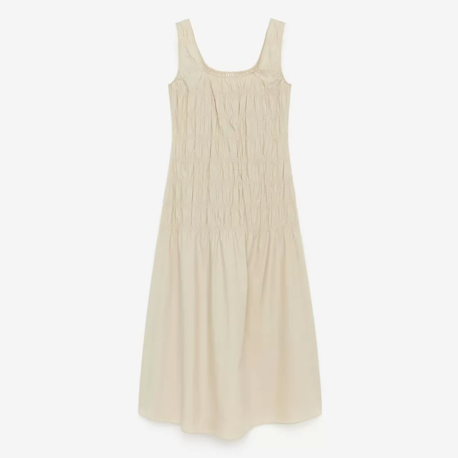 Sleeveless midi dress with smock detailing and a squared neckline. Slim fit.